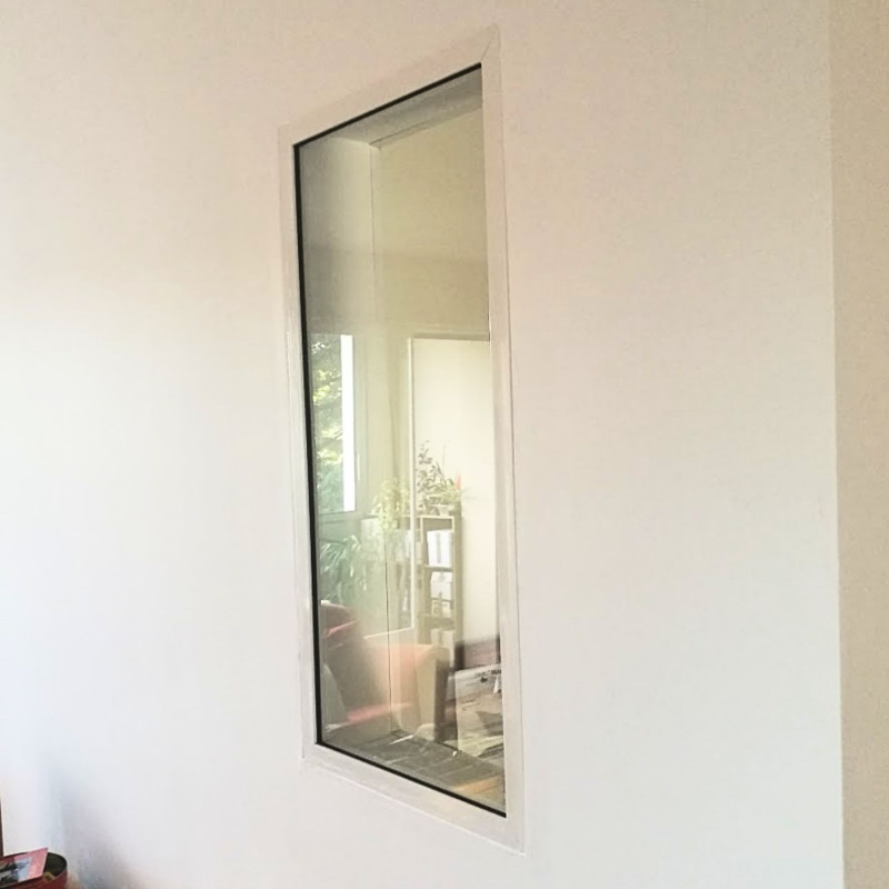 Chassis fixe -FENESTRA dans un salon